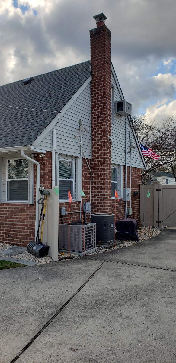 Professional chimney repointing restoring brick joints in East Hampton, NY
